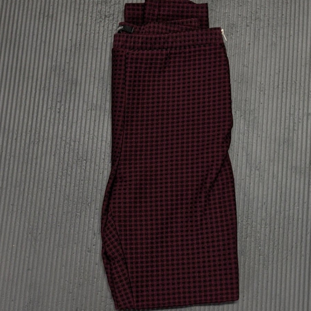 red and black pants
